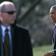 A Secret Service agent stands guard as President Barack Obama walks to Marine One while departing the White House Jan. 15, 2015, in Washington, D.C.
Mark Wilson/Getty Images